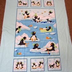 Frolicking Penguins cotton panel 