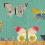 Butterflies on turquoise linen effect .