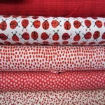 Red  and pinks quilting fabrics